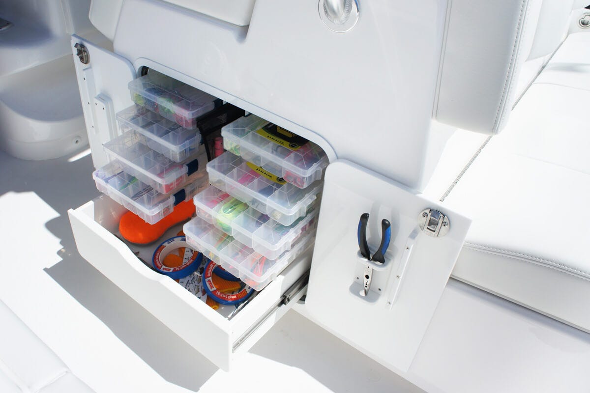 inset boat tackle box with tackle storage, drawers, and tool holders
